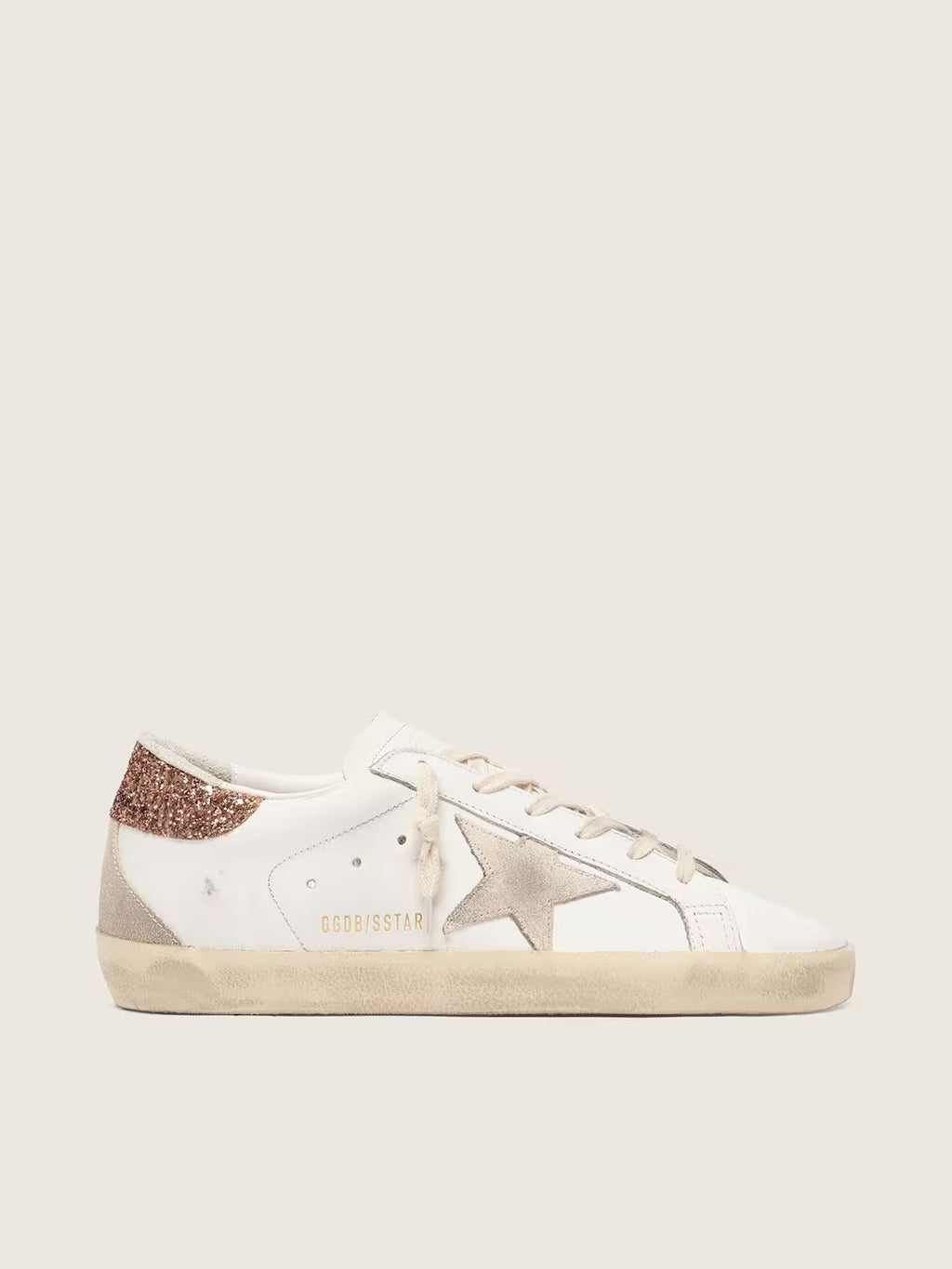 Golden Goose Super-Star avec son étoile en daim et contrefort paillettes rose pêche